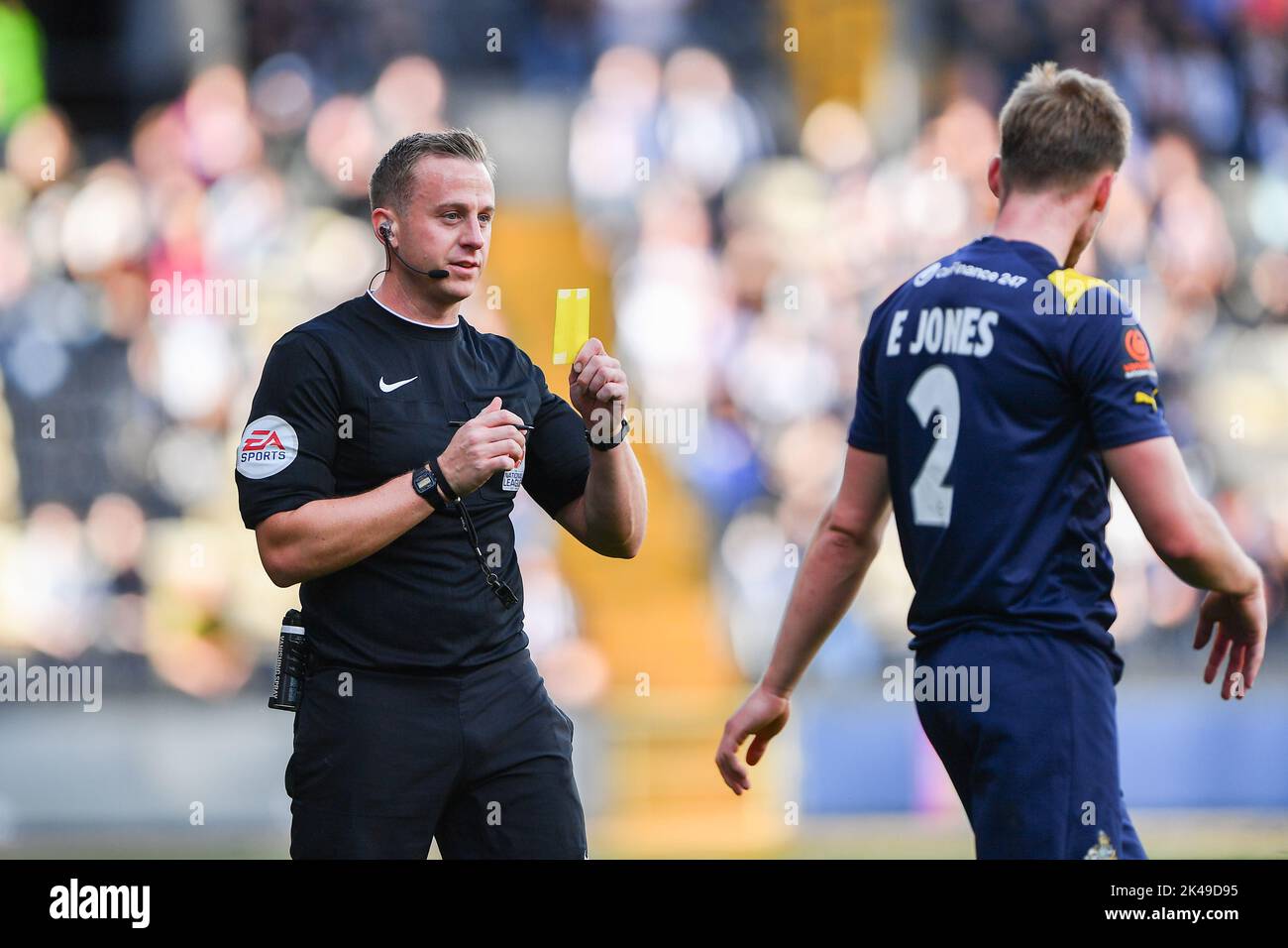 Nottingham, UK. 1st October 2022Referee, Scott Jackson shows a yellow card for unsporting behaviour to Eddy Jones of Altrincham during the Vanarama National League match between Notts County and Altrincham at Meadow Lane, Nottingham on Saturday 1st October 2022. (Credit: Jon Hobley | MI News) Credit: MI News & Sport /Alamy Live News Stock Photo