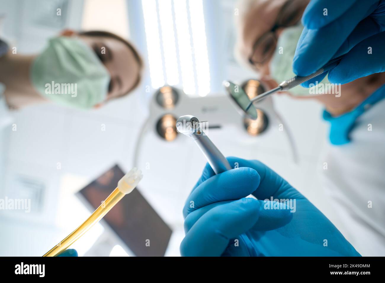 Nurse assisting in tooth surgery the woman Stock Photo Alamy