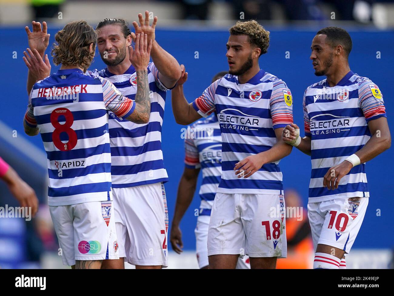 Reading's Jeff Hendrick (left) and Andy Carroll celebrate their second goal after Huddersfield Town goalkeeper Lee Nicholls scores an own goal during the Sky Bet Championship match at the Select Car Leasing Stadium, Reading. Picture date: Saturday October 1, 2022. Stock Photo