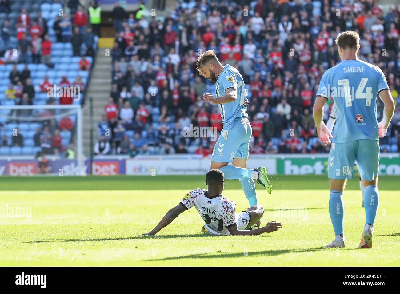 Marc Bola #27 of Middlesbrough tackles Matthew Godden #24 of Coventry City during the Sky Bet Championship match Coventry City vs Middlesbrough at Coventry Building Society Arena, Coventry, United Kingdom, 1st October 2022  (Photo by Gareth Evans/News Images) Stock Photo