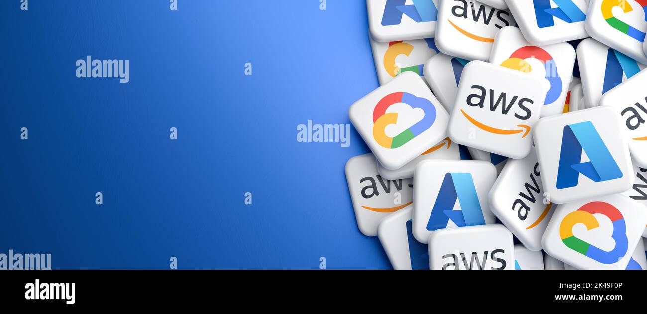 Logos of the three largest cloud computing providers Amazon AWS, Microsoft Azure and Google cloud on a heap on a table. Web banner format with copy sp Stock Photo