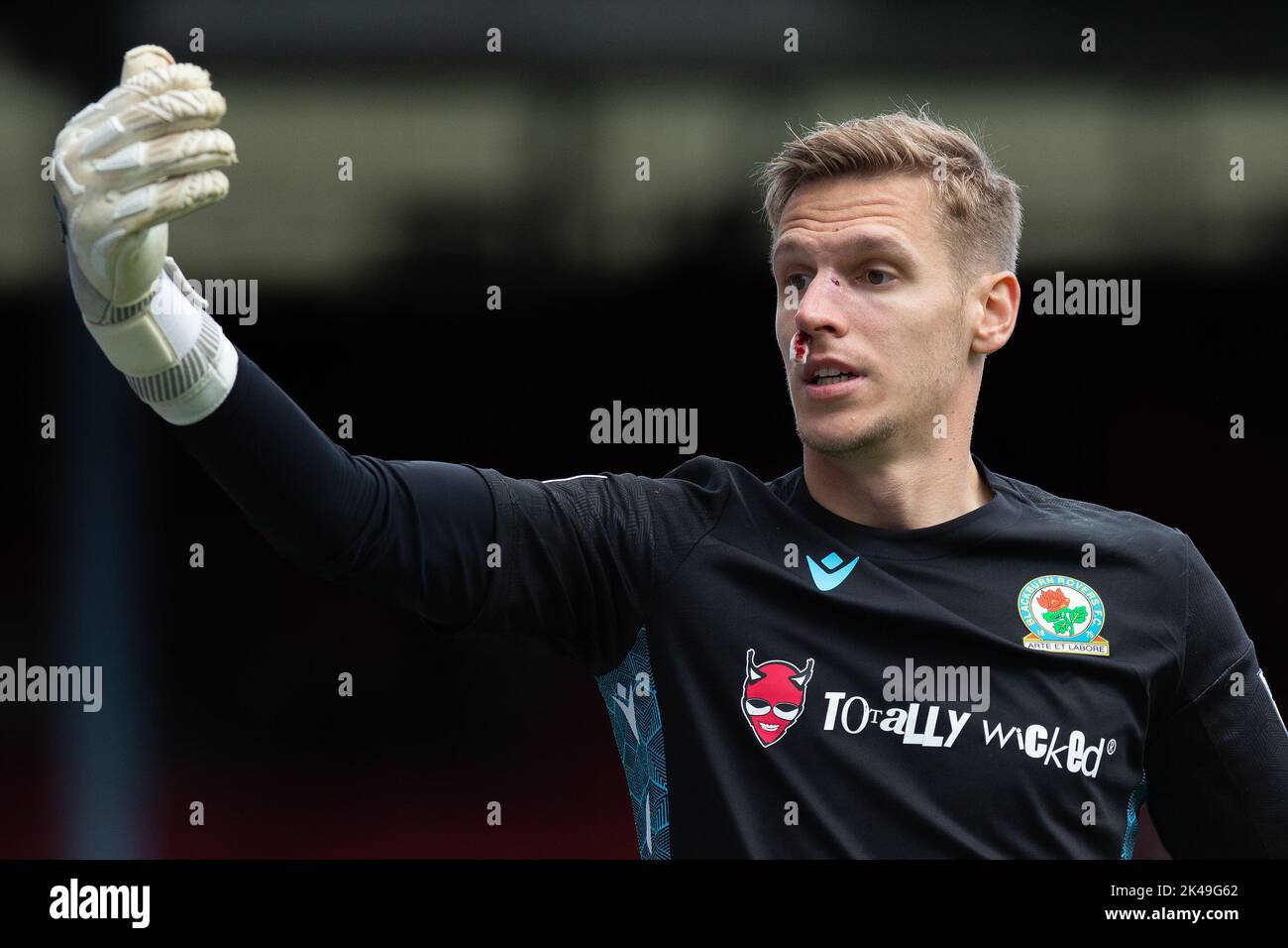 A bloody nosed Thomas Kaminski #1 of Blackburn Rovers gestures during the Sky Bet Championship match Blackburn Rovers vs Millwall at Ewood Park, Blackburn, United Kingdom, 1st October 2022  (Photo by Phil Bryan/News Images) Stock Photo