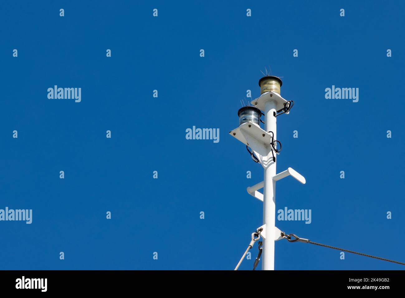 Position lights on the mast of a ship Stock Photo