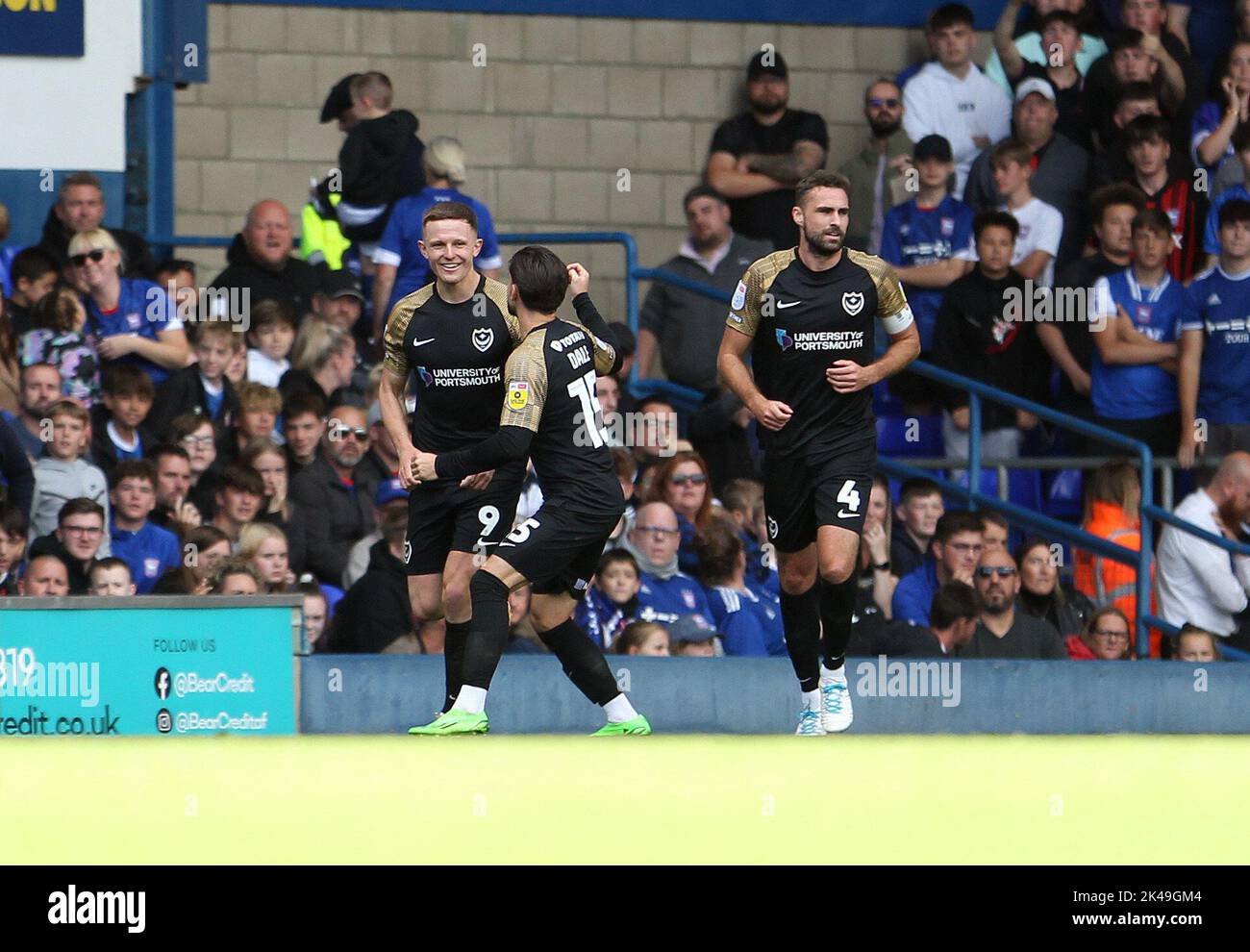 Ipswich, UK. 01st Oct, 2022. Colby Bishop of Portsmouth (L) celebrates with teammates after scoring his penalty kick and putting the scores level during the Sky Bet League One match between Ipswich Town and Portsmouth at Portman Road on October 1st 2022 in Ipswich, England. (Photo by Mick Kearns/phcimages.com) Credit: PHC Images/Alamy Live News Stock Photo