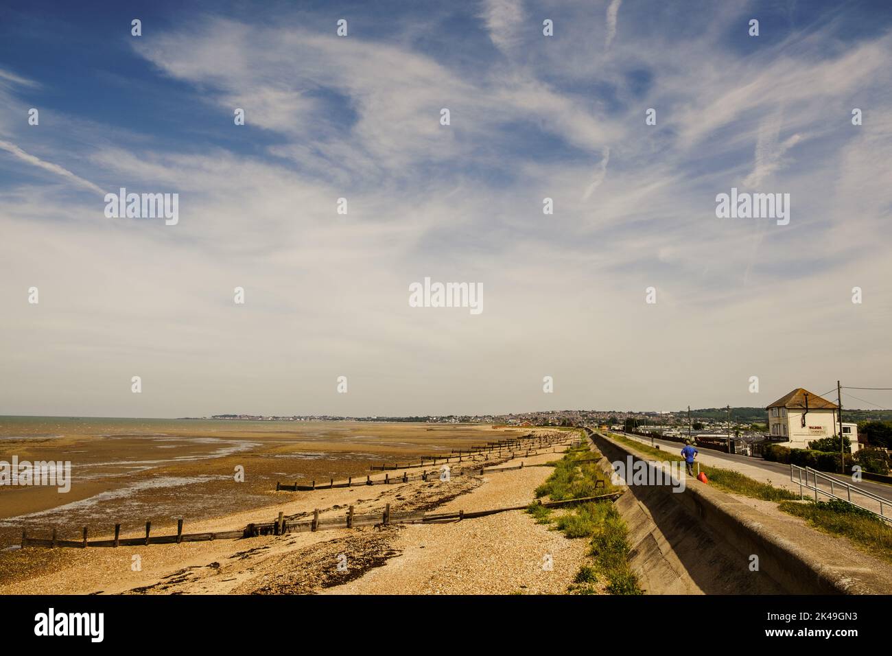 The beach west of Seasalter, Kent - at low tide Stock Photo
