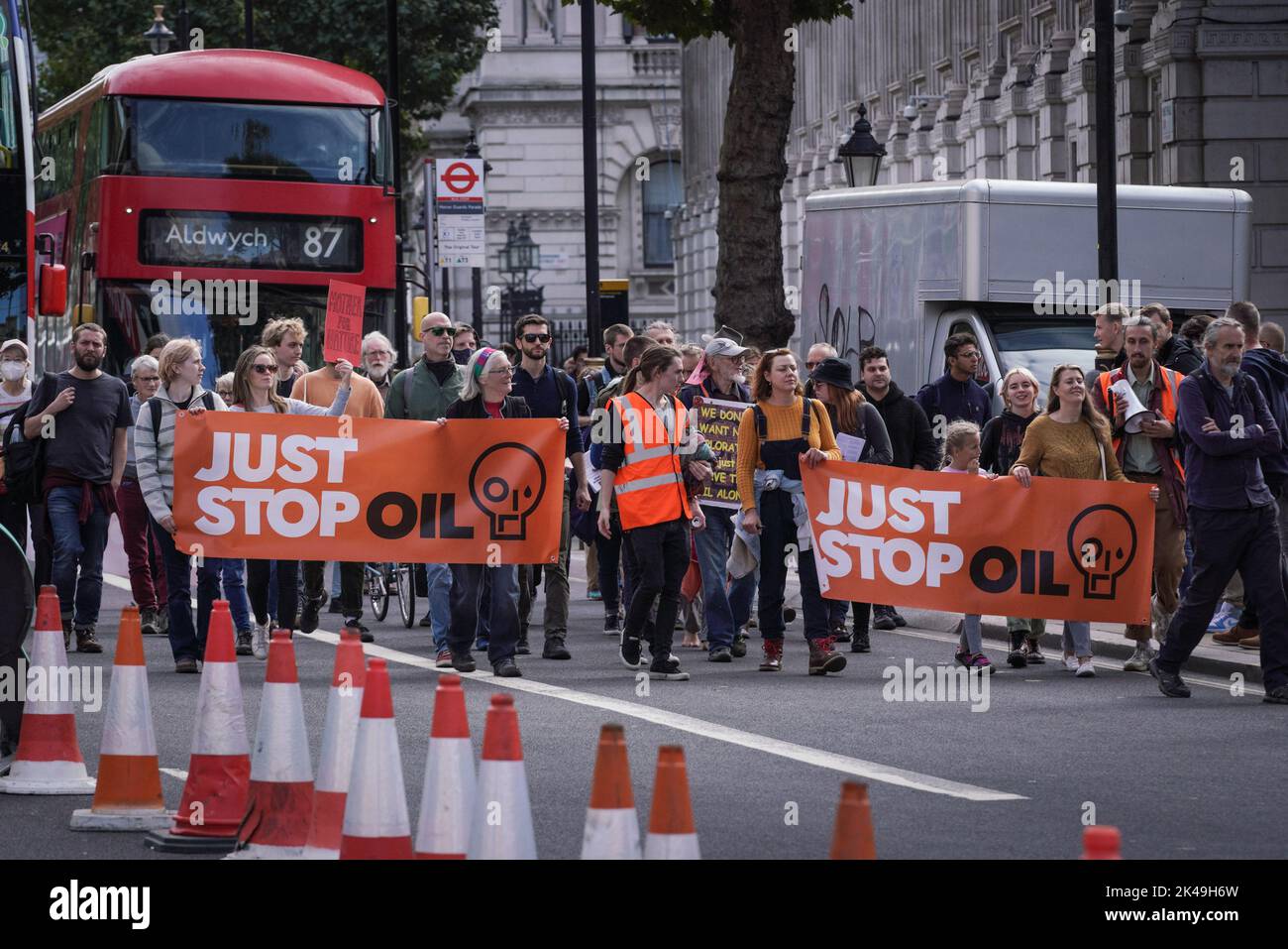London, UK. 1st October, 2022. Environmental protesters from Just Stop Oil march down Whitehall in Westminster continuing their campaign against UK and worldwide fossil fuel usage. Credit: Guy Corbishley/Alamy Live News Stock Photo