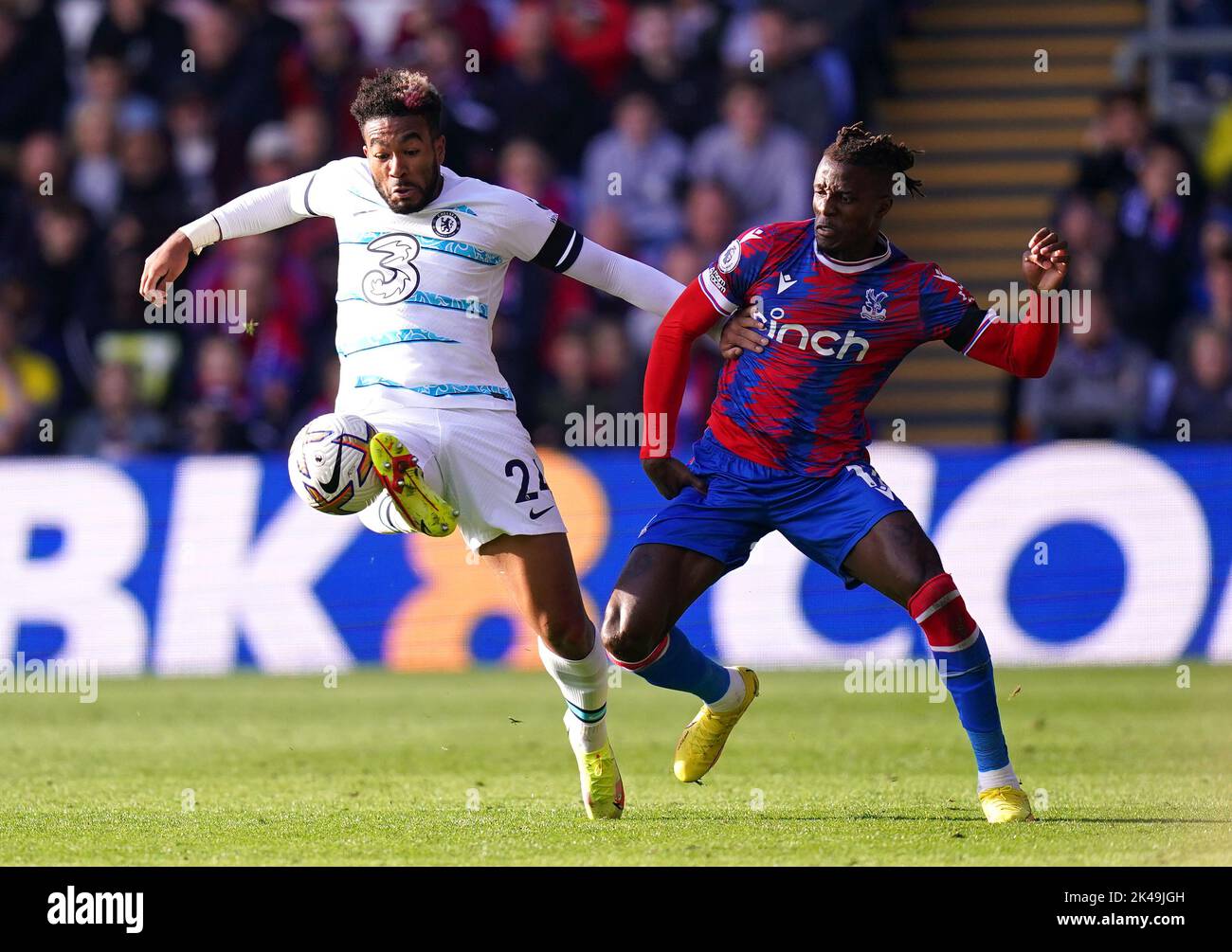 Chelsea's Reece James (left) and Crystal Palace's Wilfried Zaha battle for the ball during the Premier League match at Selhurst Park, London. Picture date: Saturday October 1, 2022. Stock Photo