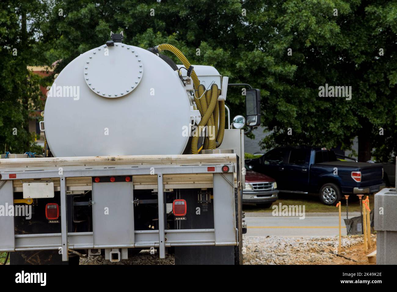 Septic truck in cleaning portable restroom Stock Photo Alamy