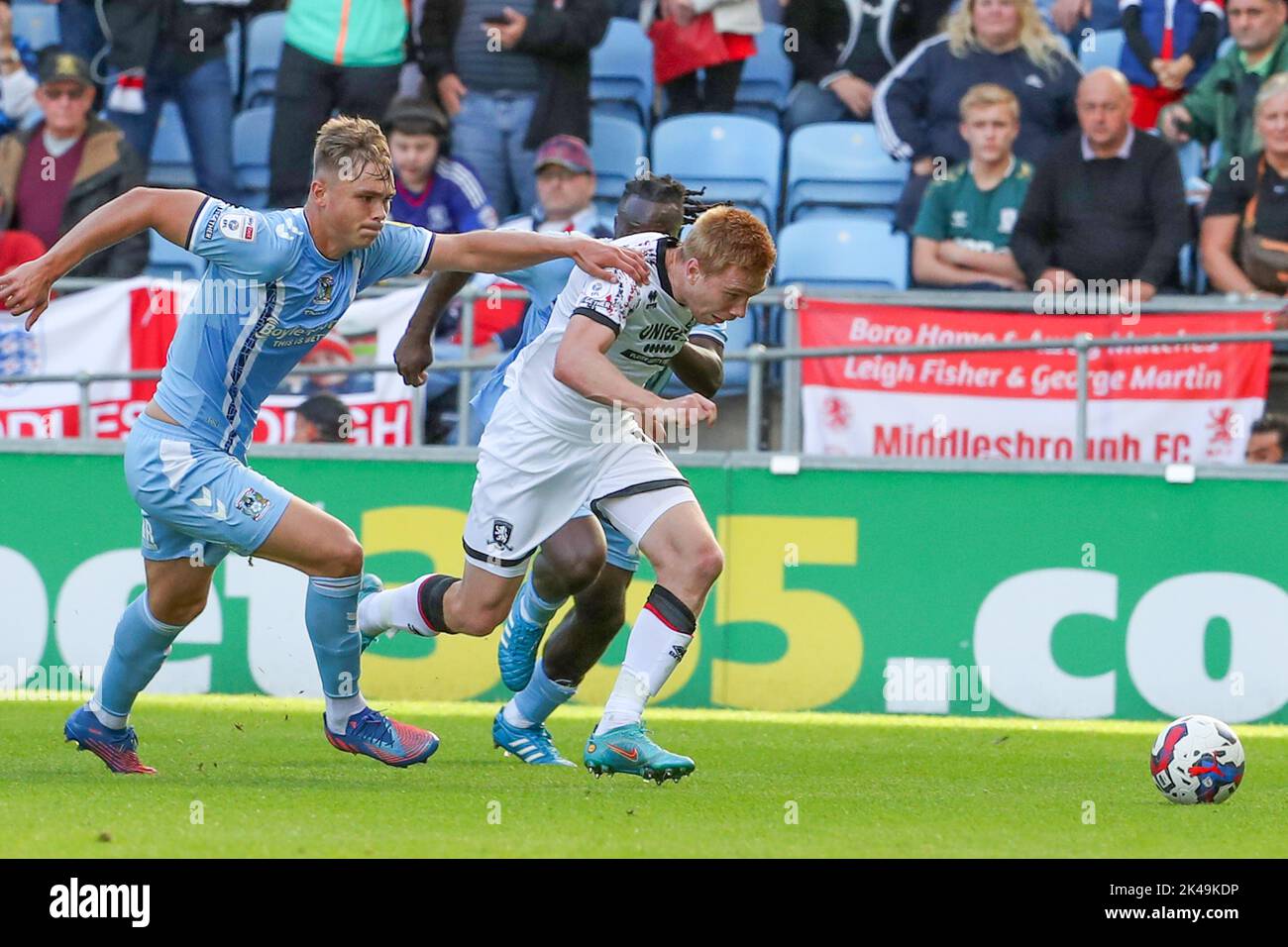 Coventry, UK. 1st October 2022Middlesbrough's Duncan Watmore is challenged by Coventry City's Callum Doyle during the first half of the Sky Bet Championship match between Coventry City and Middlesbrough at the Coventry Building Society Arena, Coventry on Saturday 1st October 2022. (Credit: John Cripps | MI News) Credit: MI News & Sport /Alamy Live News Stock Photo