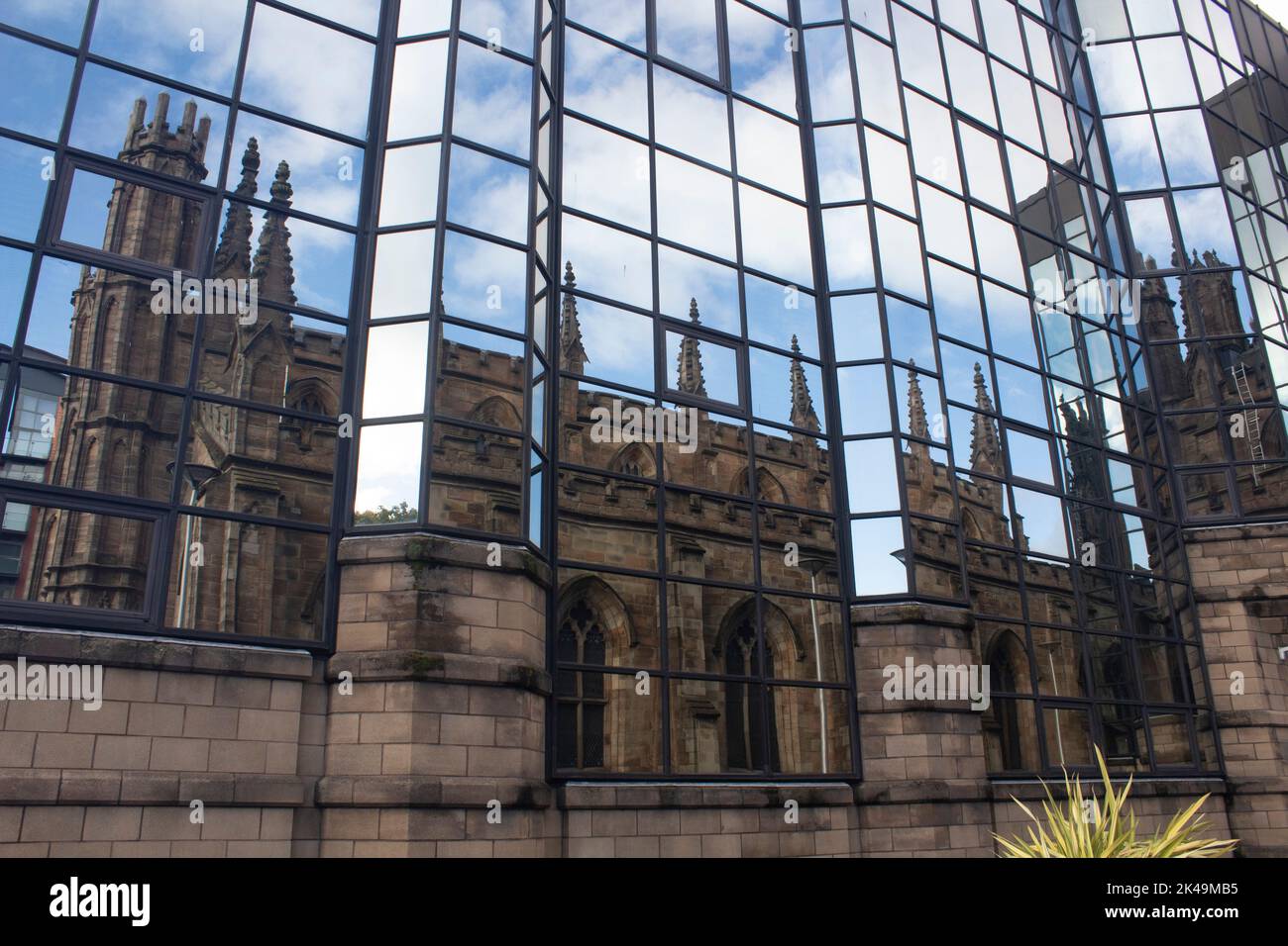 The Metropolitan Cathedral Church of Saint Andrew or Glasgow Metropolitan, reflected onto a modern office block, Glasgow Scotland UK Stock Photo