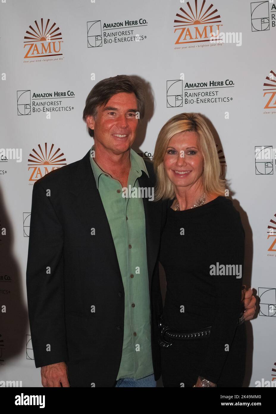 Olivia Newton-John and her husband John Easterling visit a Amazon Herb showcase for the Zamu health drink in Cologne on October 6, 2009 Stock Photo