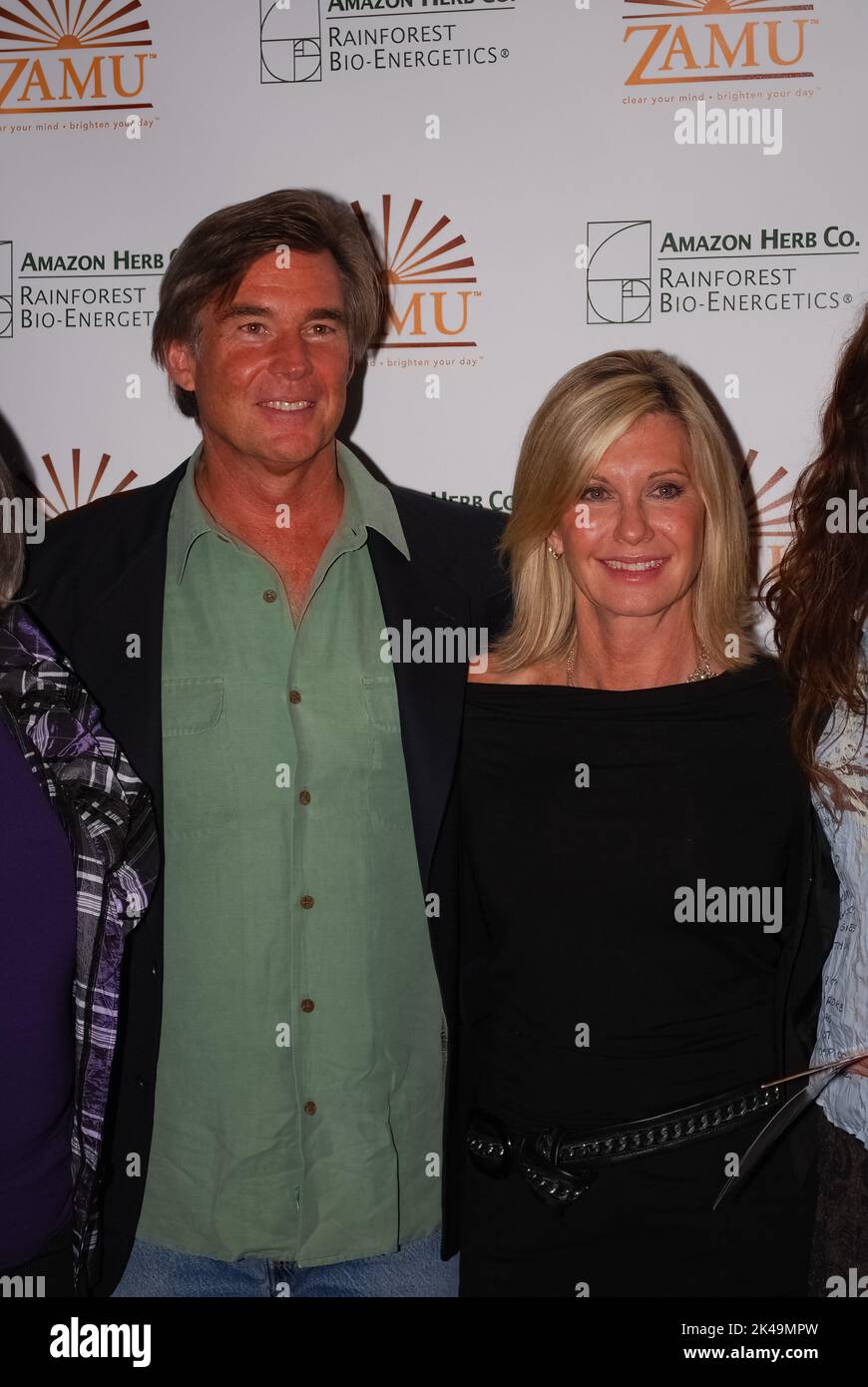 Olivia Newton-John and her husband John Easterling visit a Amazon Herb showcase for the Zamu health drink in Cologne on October 6, 2009 Stock Photo