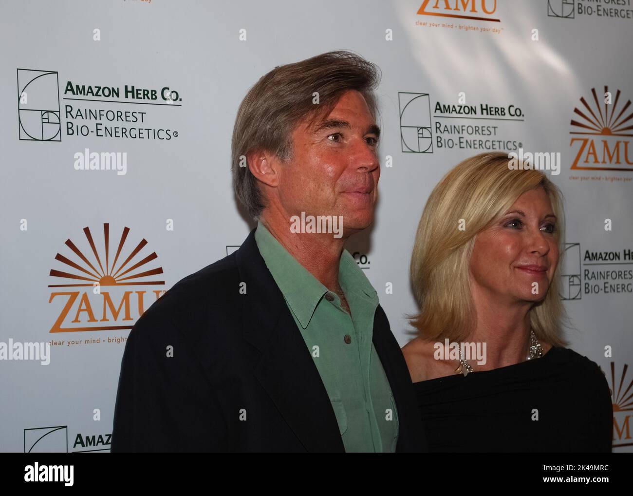 Cologne, Germany - October 6, 2009: Olivia Newton-John and her husband John Easterling visit a Amazon Herb showcase for the Zamu health drink in Colog Stock Photo