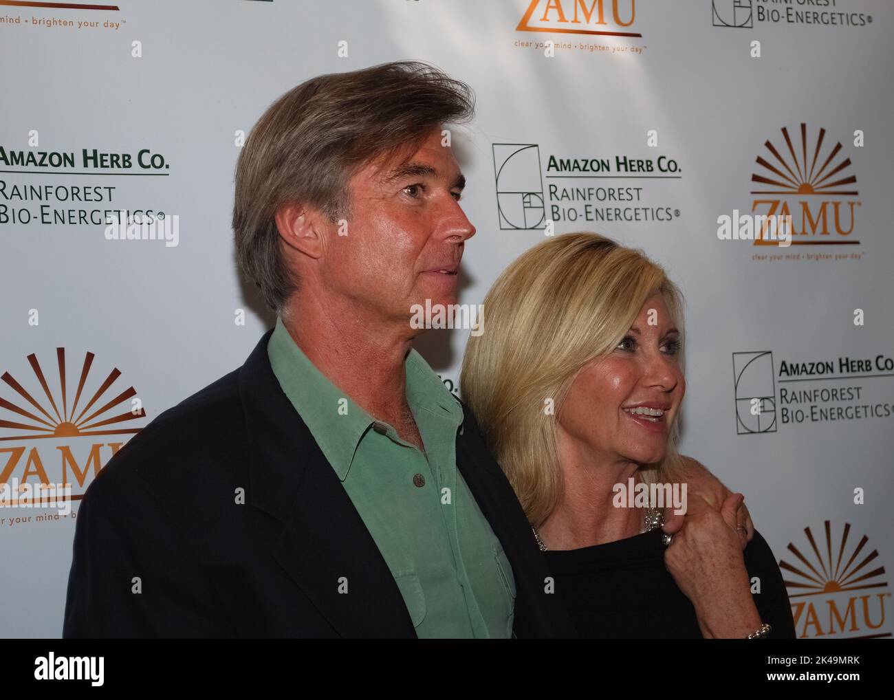 Cologne, Germany - October 6, 2009: Olivia Newton-John and her husband John Easterling visit a Amazon Herb showcase for the Zamu health drink in Colog Stock Photo