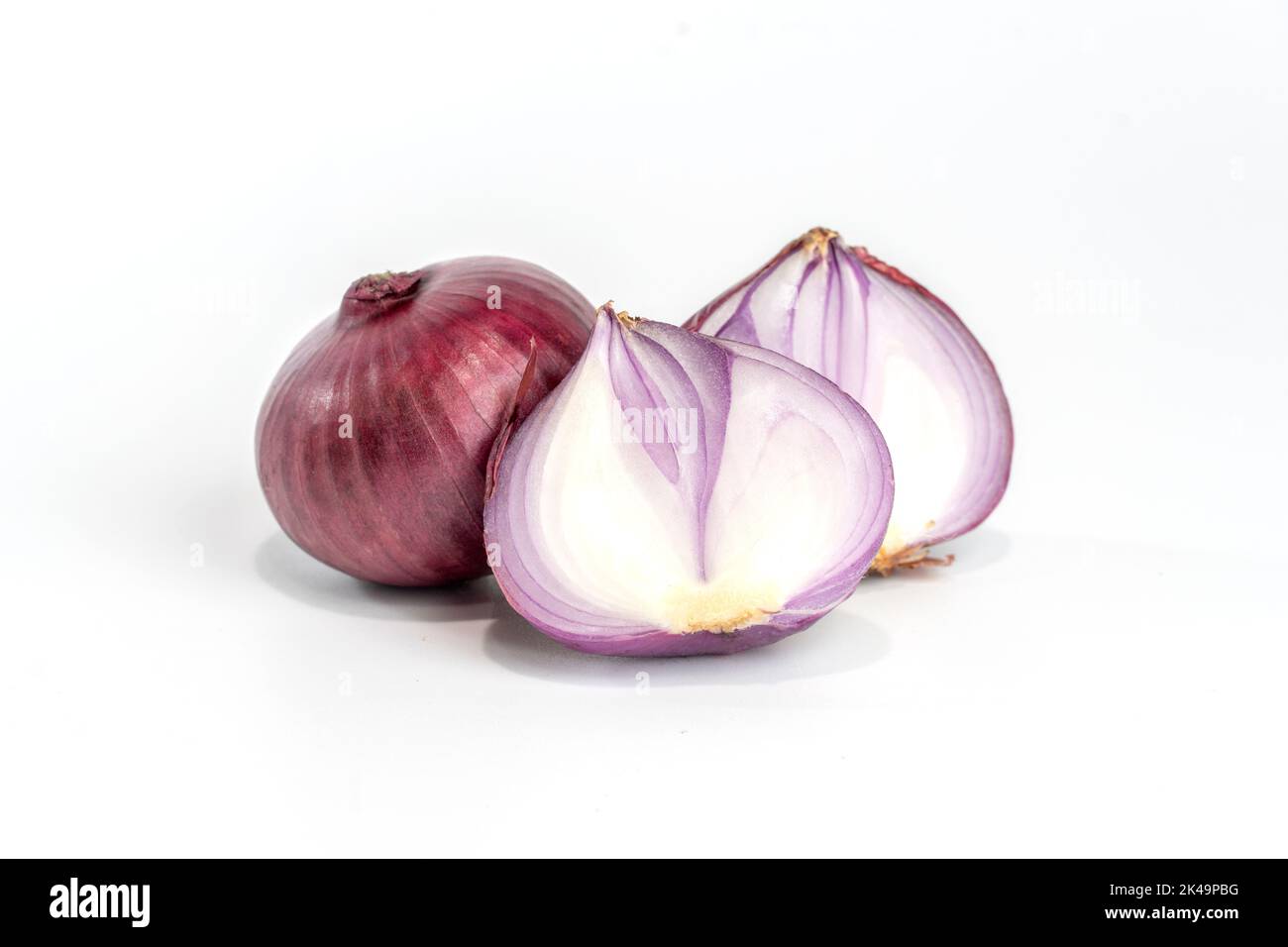 Red onion slice half, isolated on white background. Stock Photo