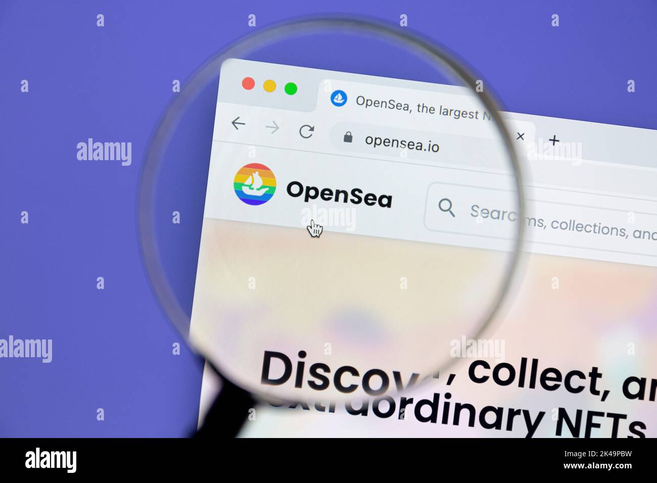 Ostersund, Sweden - July 1, 2020: OpenSea website under a magnifying glass. OpenSea is an American online non-fungible token (NFT) marketplace. Stock Photo