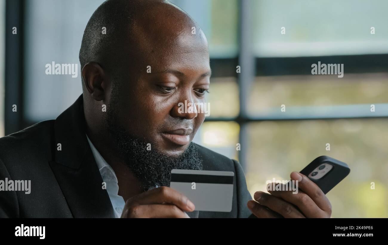 African customer businessman entering credit card data use security