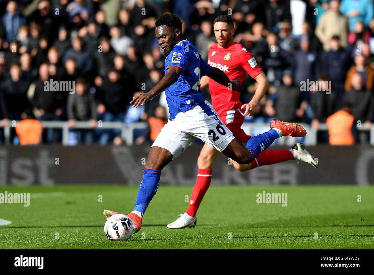 Oldham, UK. 1st October 2022during the Vanarama National League match between Oldham Athletic and Wrexham at Boundary Park, Oldham on Saturday 1st October 2022Mike Fondop-Talom of Oldham Athletic scores his side's first goal of the game during the Vanarama National League match between Oldham Athletic and Wrexham at Boundary Park, Oldham on Saturday 1st October 2022. Credit: MI News & Sport /Alamy Live News Stock Photo