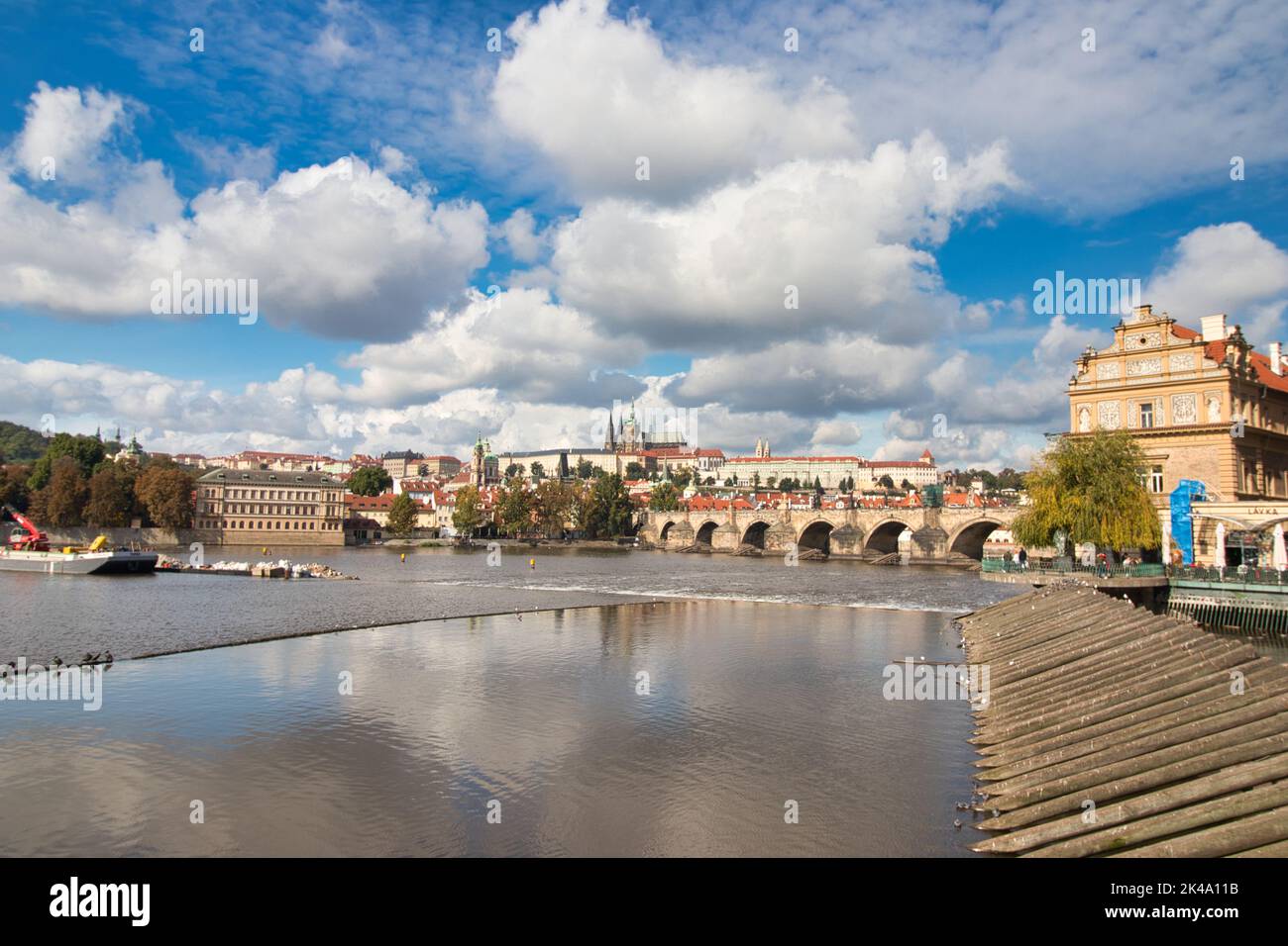 Panorama of Prague Castle and Charles bridge in autumn sunny day. Prague, Czech Republic. Stock Photo