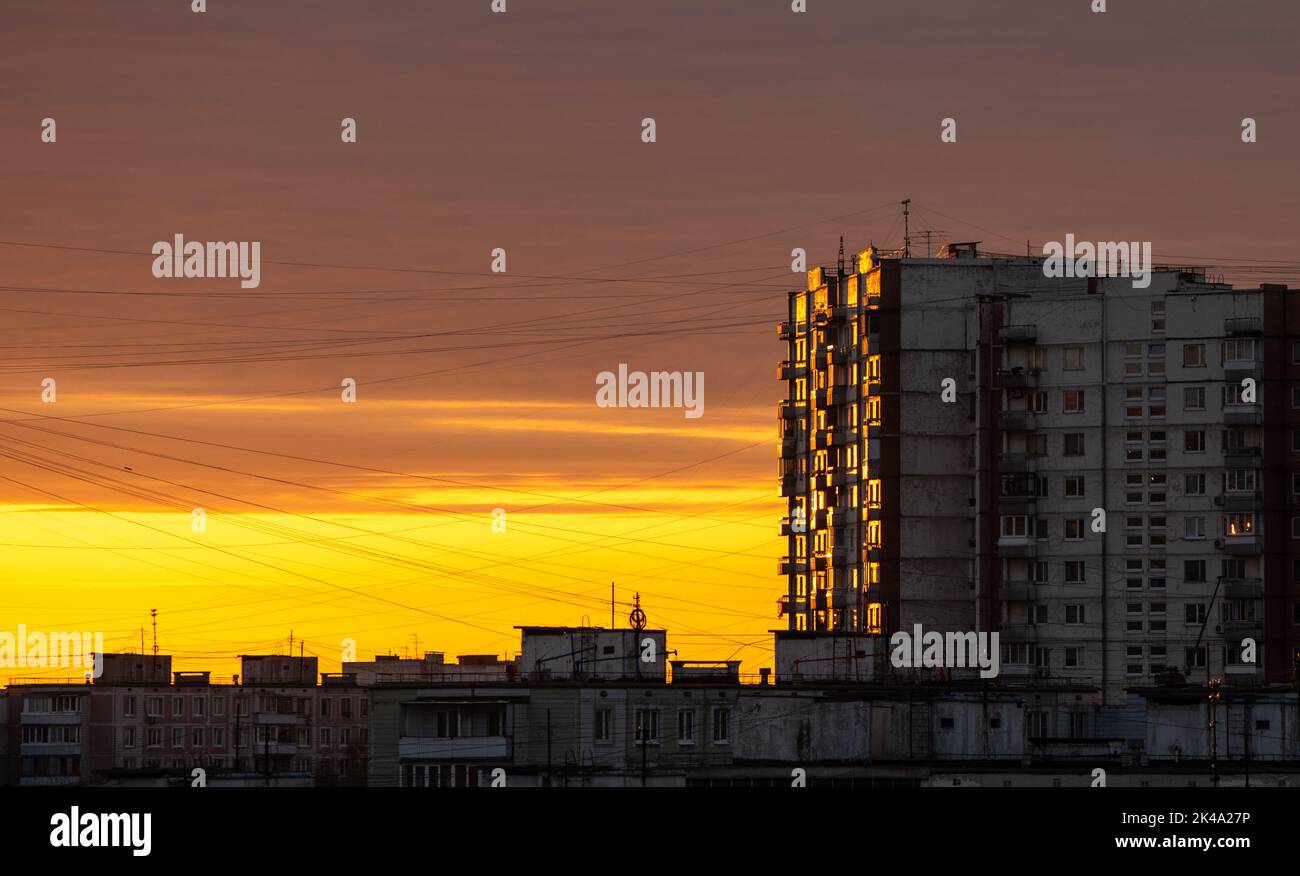 Sunlit multi-storey residential buildings in the residential area of Yasenevo in the south of the Russian capital at dawn. Stock Photo