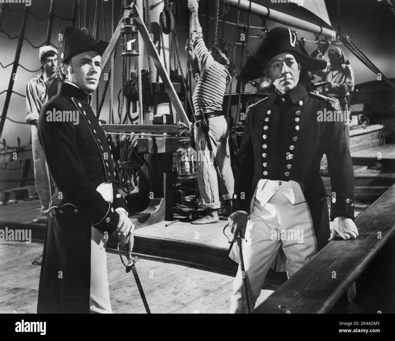 Dirk Bogarde, Alec Guinness, on-set of the British Film, "H.M.S. Defiant", U.S. Title, "Damn the Defiant!", Columbia Pictures, 1962 Stock Photo