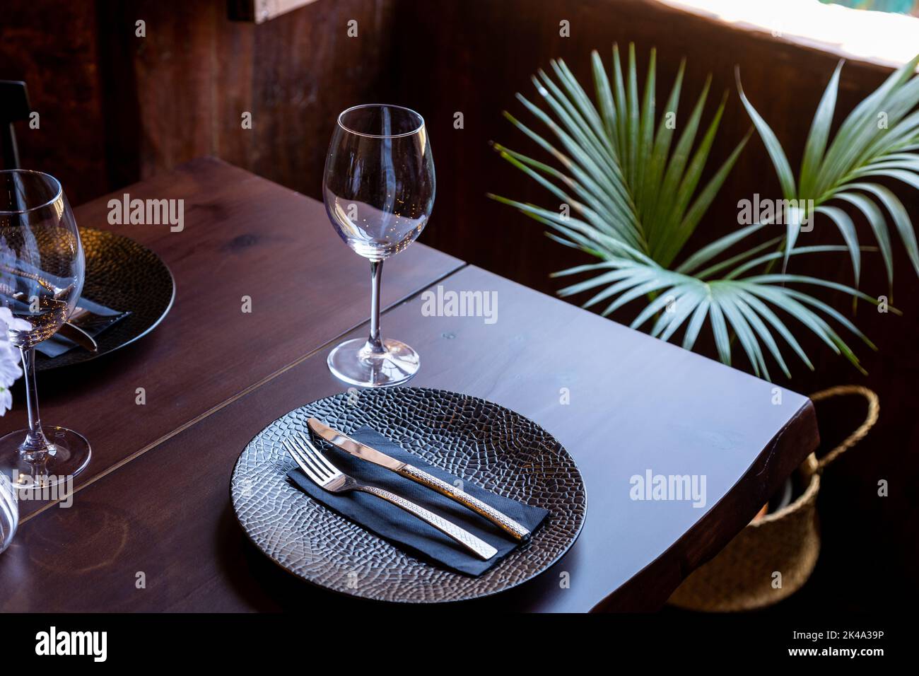 The interior of a restaurant with tables ready to be served Stock Photo ...