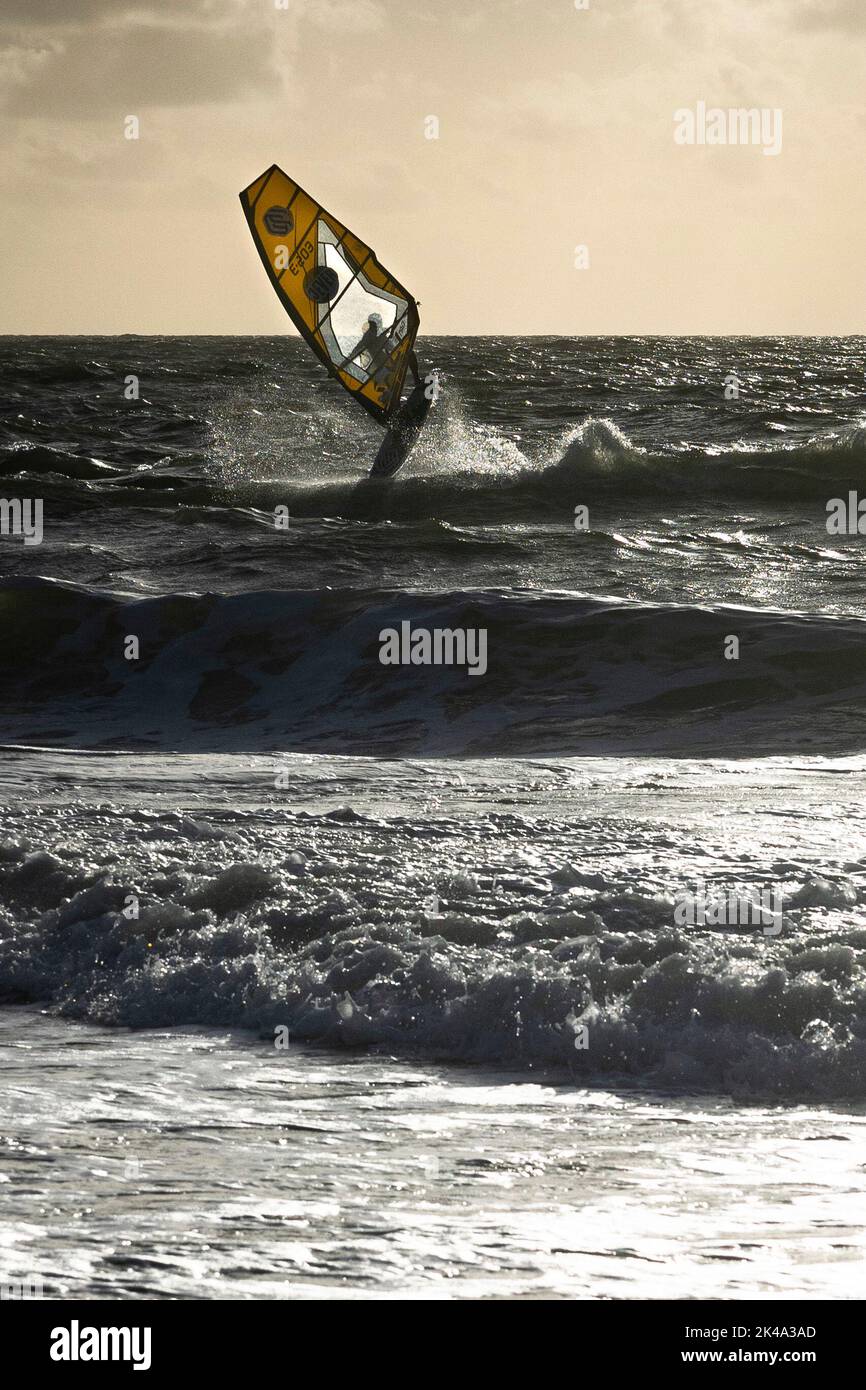 01 October 2022, SchleswigHolstein, Westerland/Sylt A windsurfer
