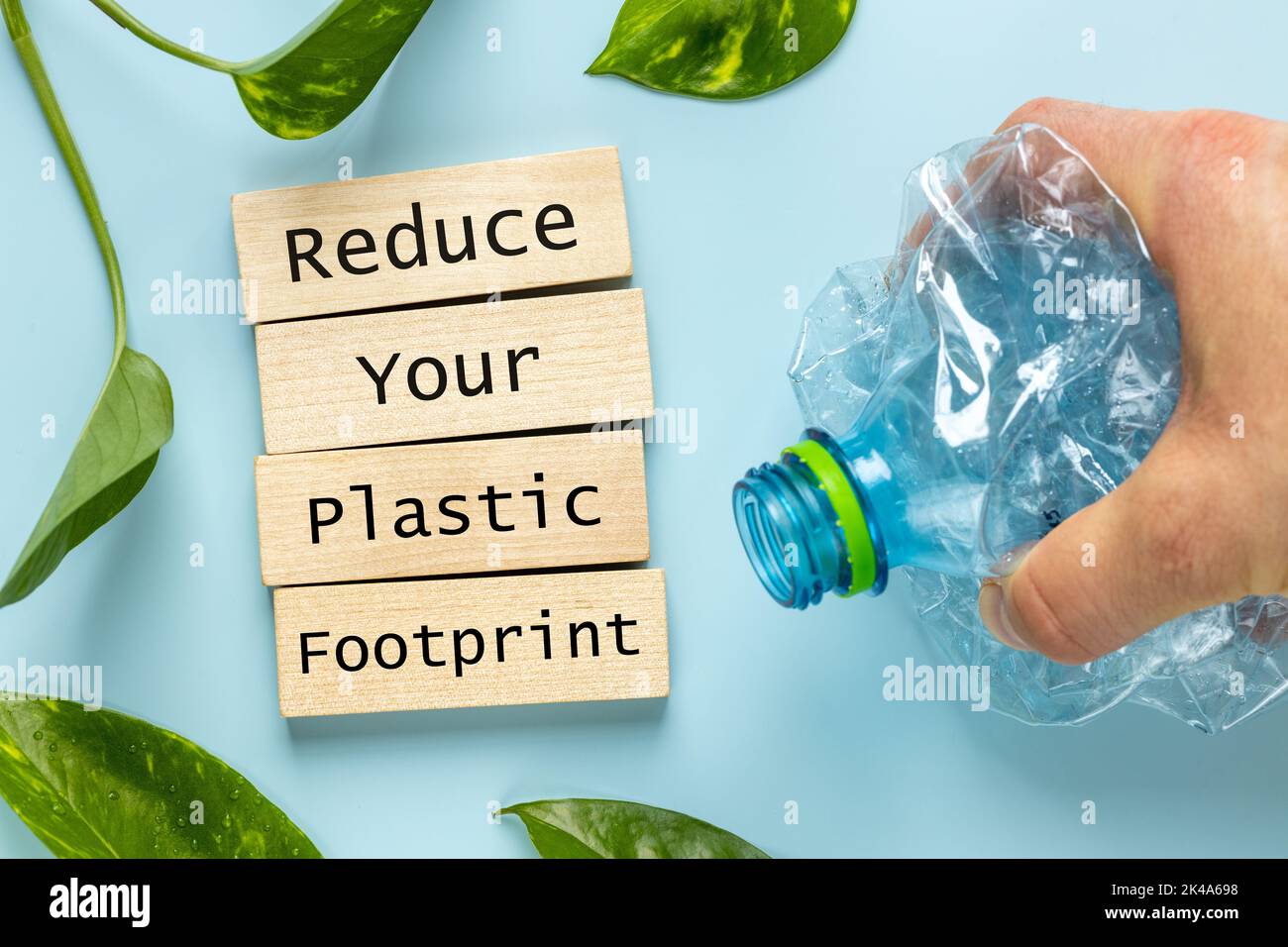 Hand crushing plastic bottle, Wooden block saved, Reduce Your plastic footprint, Environmental