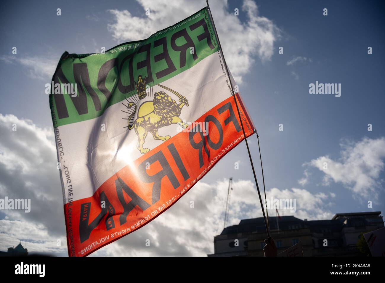 Protestors gathered in Trafalgar Square, demonstrating against the death of Mahsa Amini who died whilst been detained by the Iranian police. Stock Photo