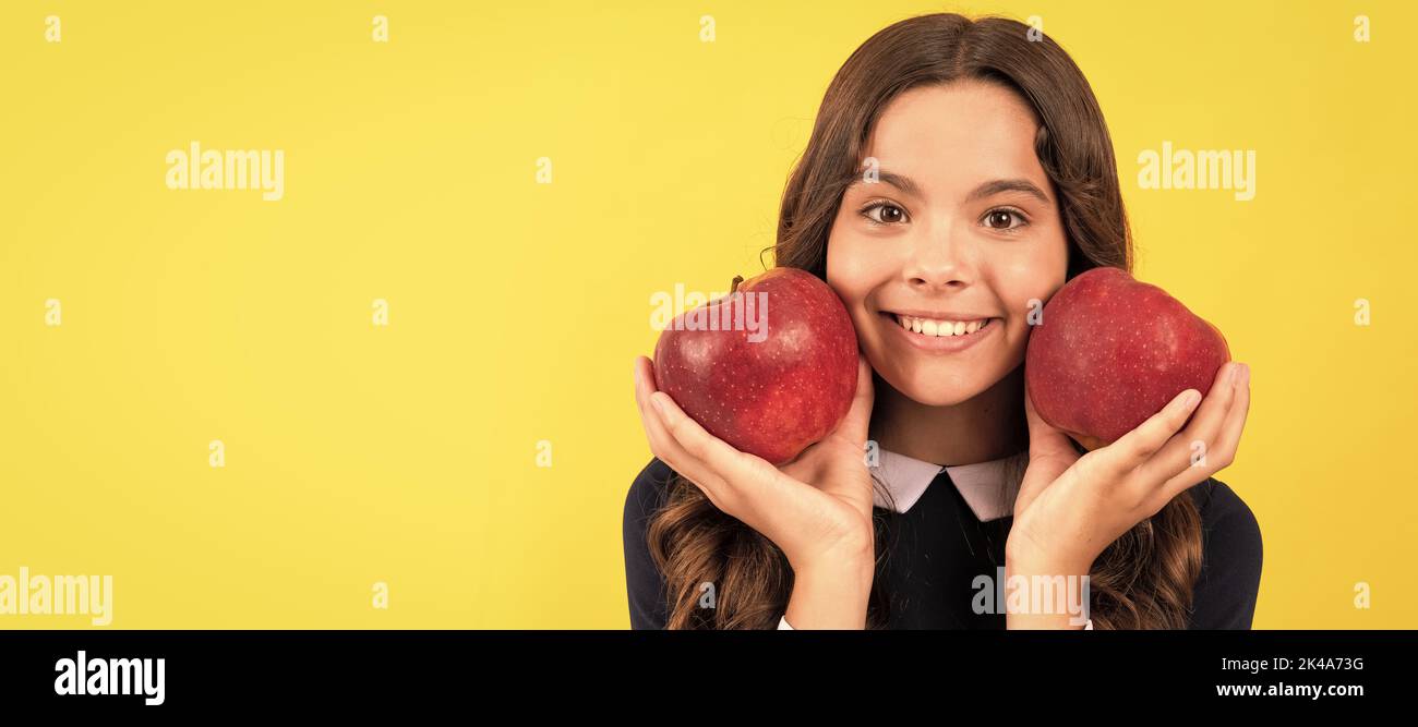 diet and kid beauty. dental care. lunch break. detox. cheerful teen girl with apple fruit. Child girl portrait with apple, horizontal poster. Banner Stock Photo