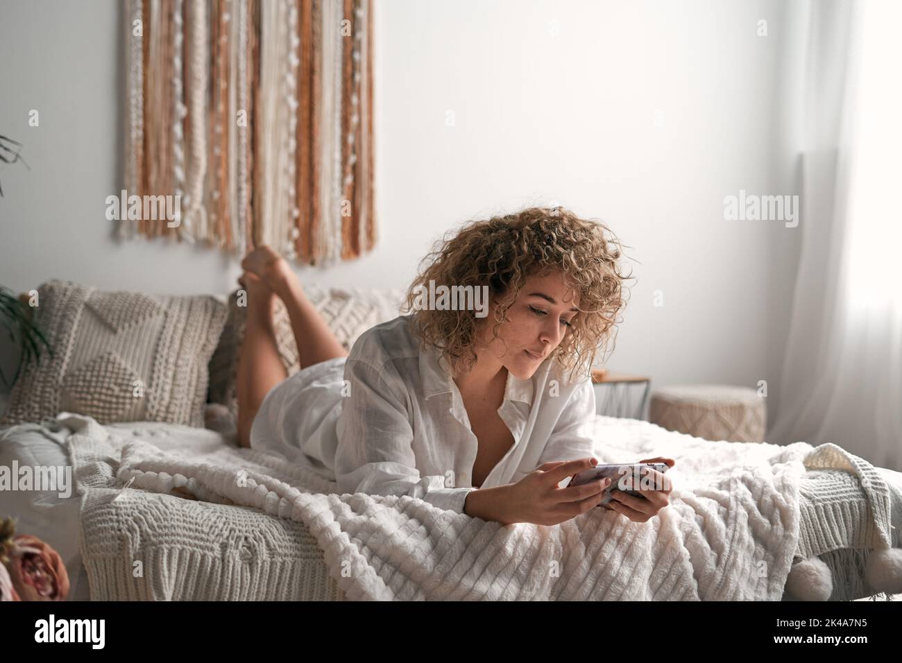 Woman lying bed full body hi-res stock photography and images - Alamy