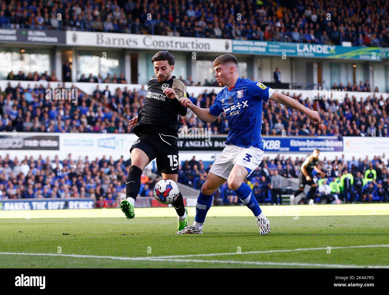 Ipswich, UK. 01st Oct, 2022. Leif Davis of Ipswich Town takes on Owen Dale of Portsmouth during the Sky Bet League One match between Ipswich Town and Portsmouth at Portman Road on October 1st 2022 in Ipswich, England. (Photo by Mick Kearns/phcimages.com) Credit: PHC Images/Alamy Live News Stock Photo