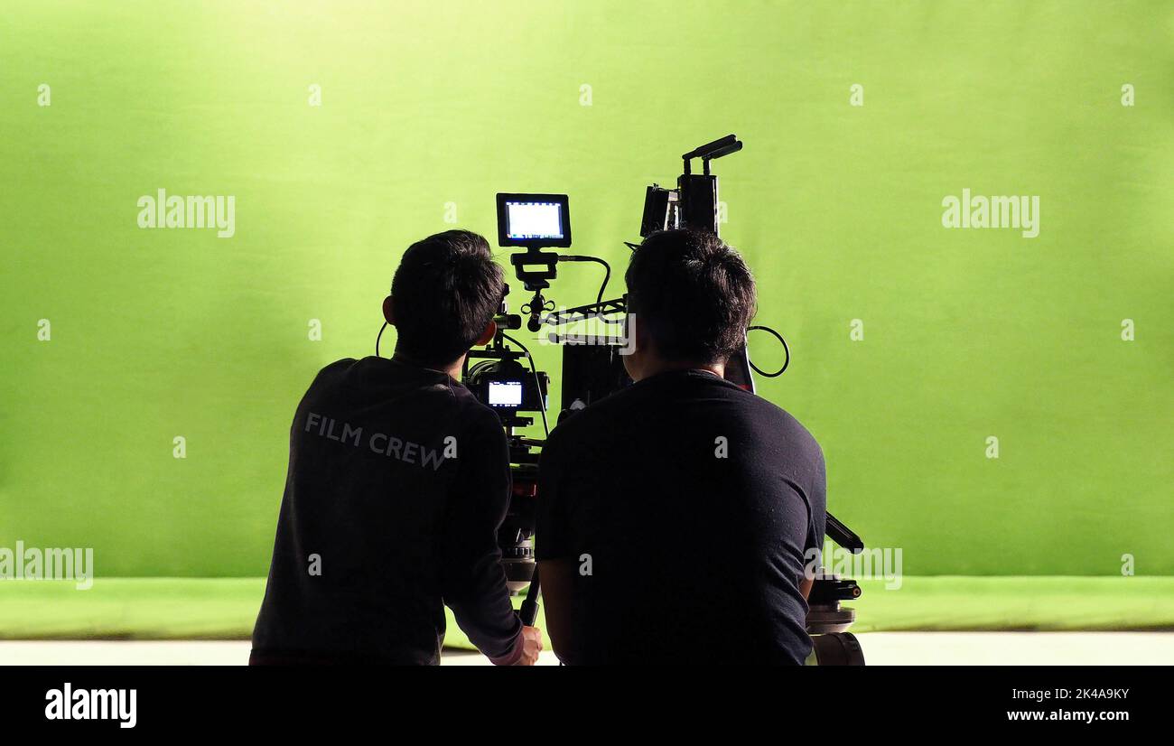 Photographer team and film crew and high online video camera