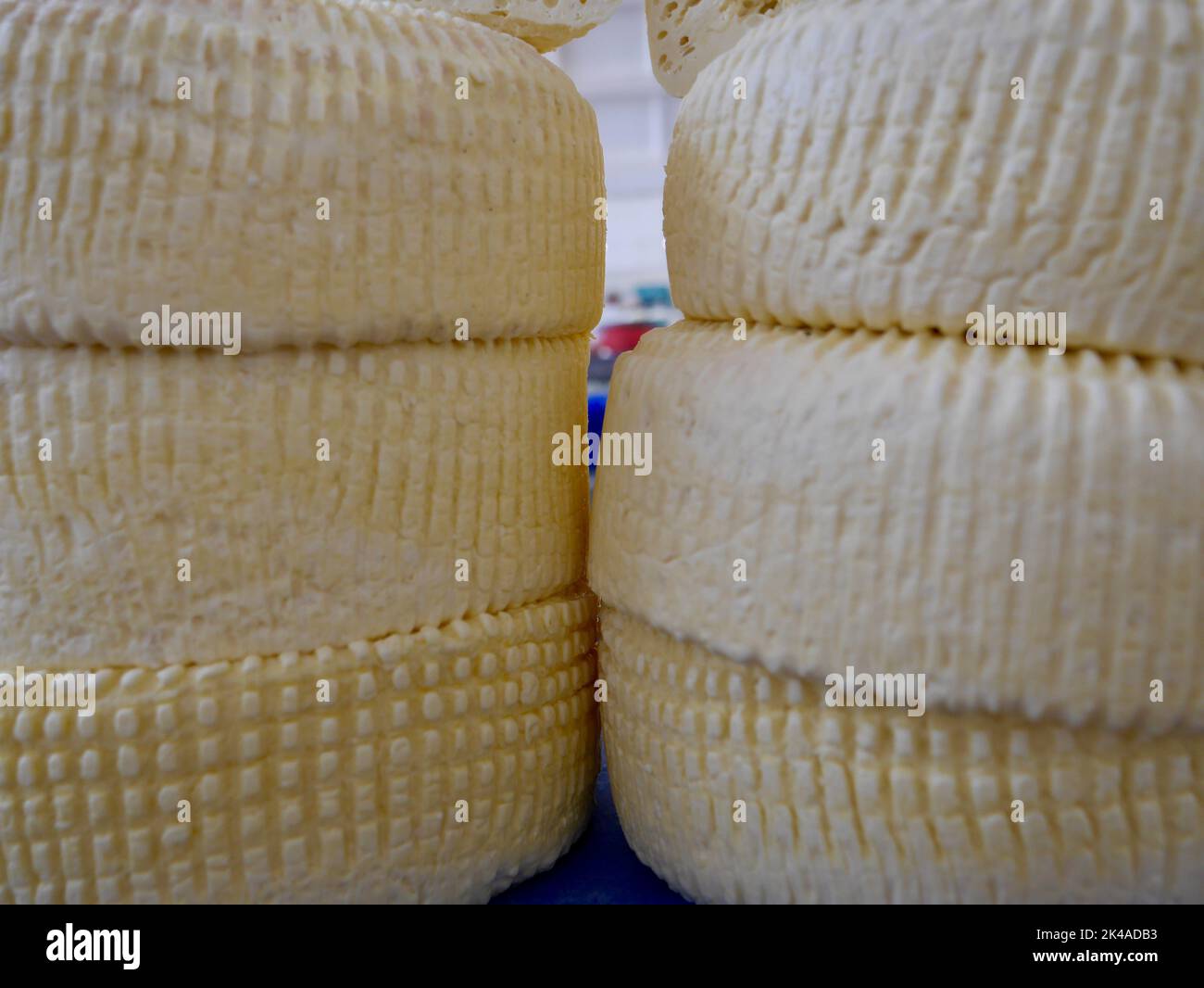 Close up of homemade Georgian Sulguni cheese for sale at local famers market. High quality photo Stock Photo