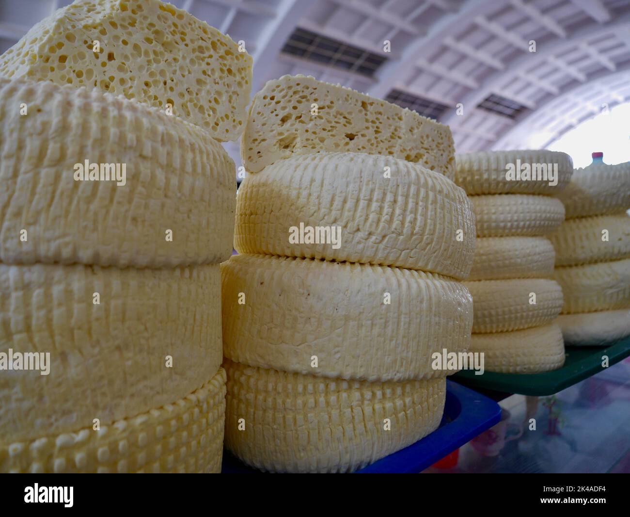 Close up of homemade Georgian Sulguni cheese for sale at local famers market. High quality photo Stock Photo