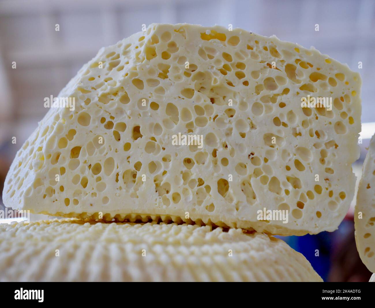 Close up of homemade Georgian Sulguni cheese for sale at local famers market. High quality photo Stock Photo