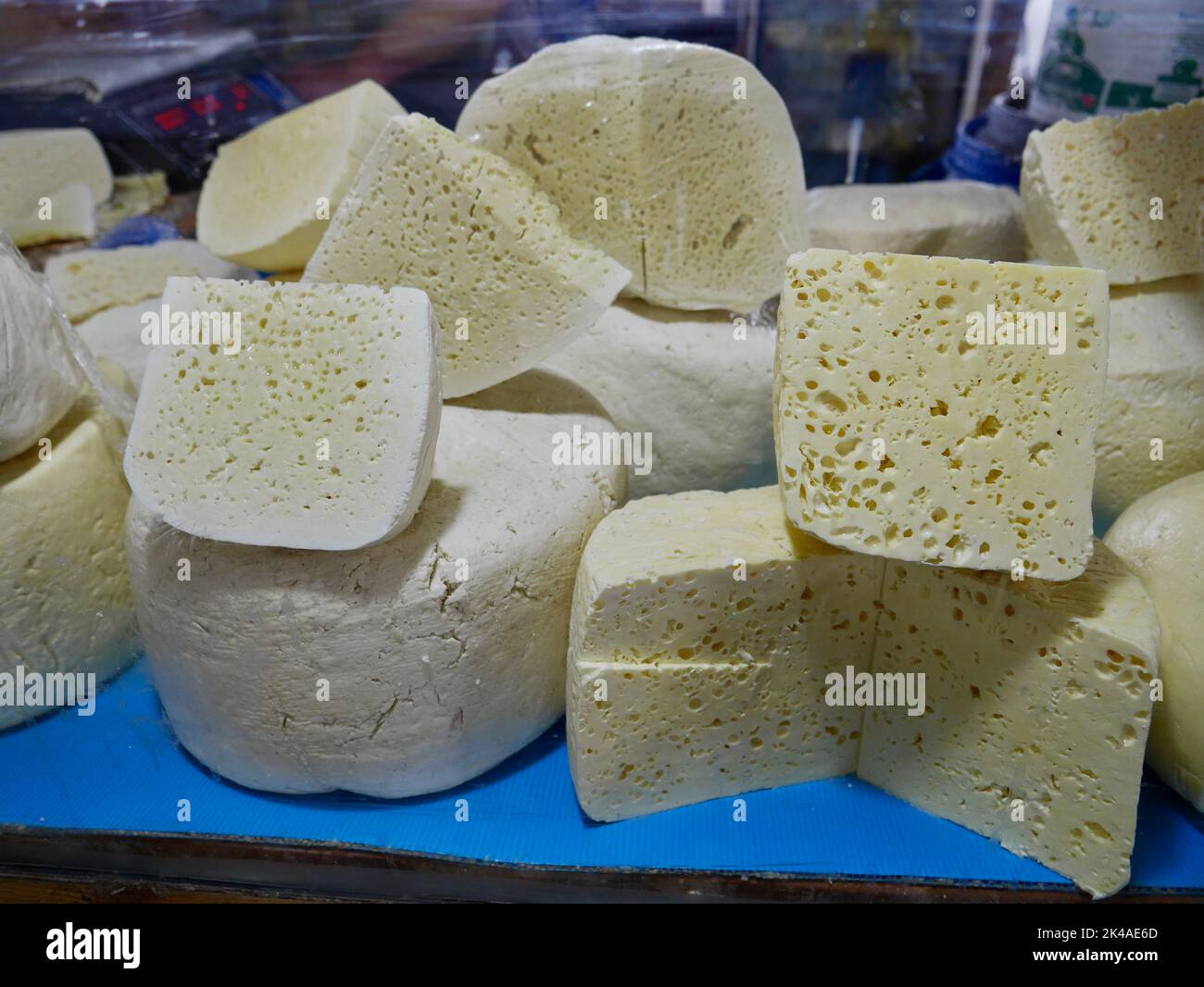 Close up of homemade Georgian Sulguni cheese for sale at local famers market. High quality photo Stock Photo