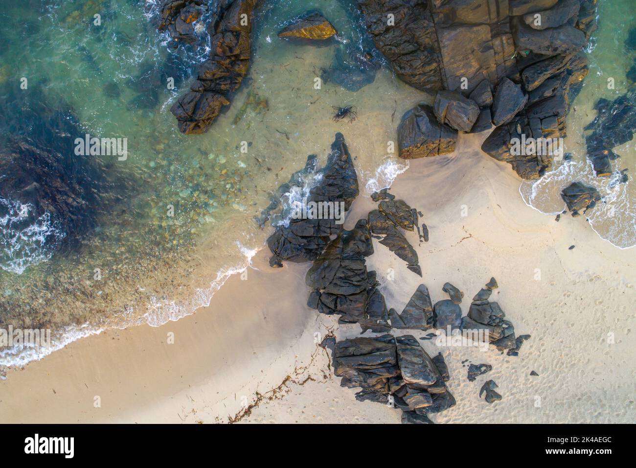 Aerial view of rocky beach and ocean with waves Stock Photo - Alamy