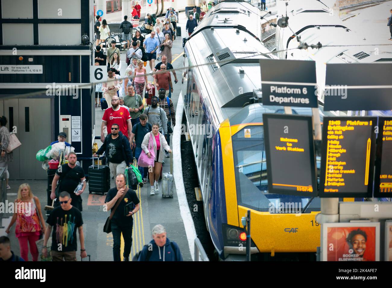 Rail passengers disembark trains at York train station in North Yorkshire as the UK rail strikes continues in June 2022 throughout the country as 40,0 Stock Photo