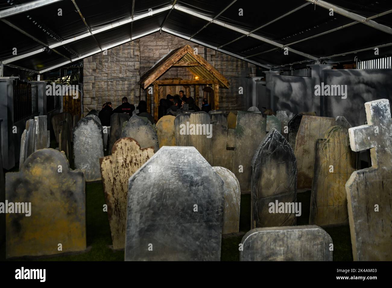 Crawley, UK. 30th Sep, 2022. Tulleys popular Shocktober Fest launches a new, large, scare maze for 2022 - Doom Town. The town is governed by evil and inhabited by the dead; walking corpses whose only need is to earn back their place back in hell. Credit: Thomas Faull/Alamy Live News Stock Photo