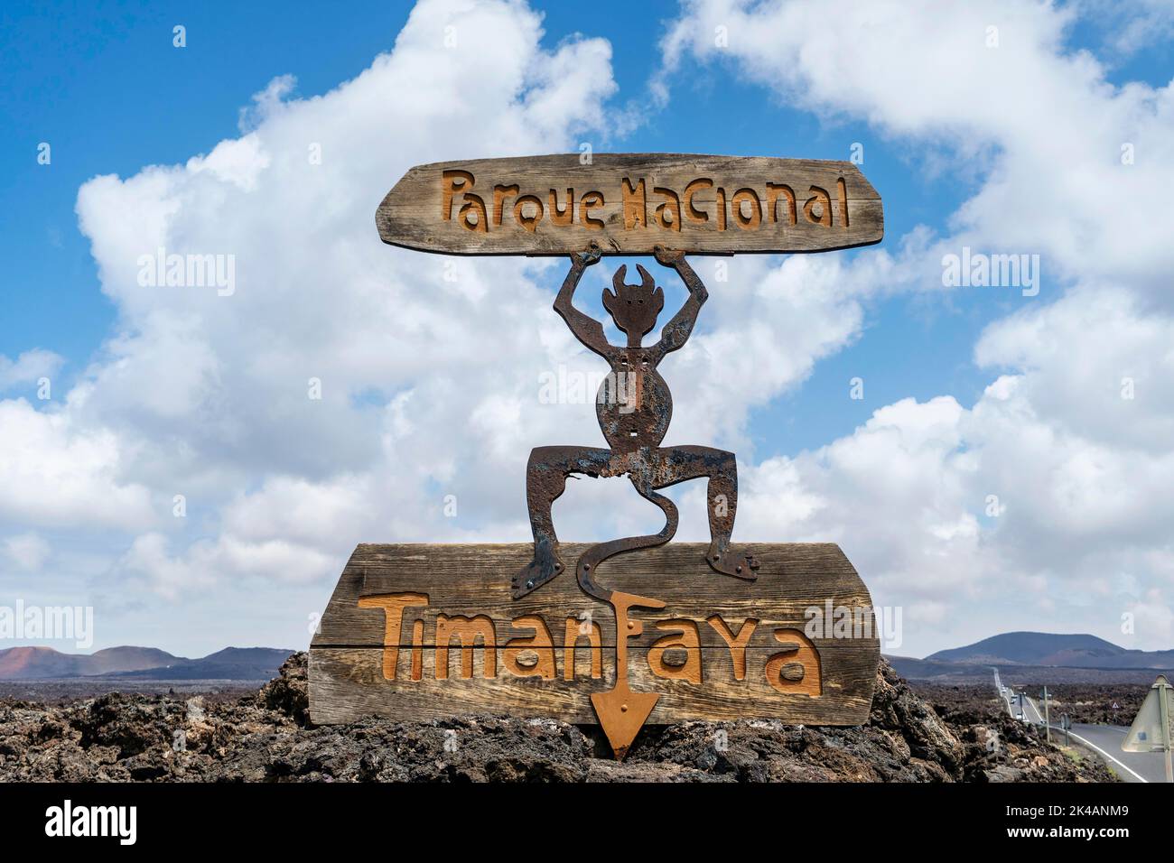 Timanfaya National Park sign on volcanic black rocks in Lanzarote, Canary Islands, Spain Stock Photo