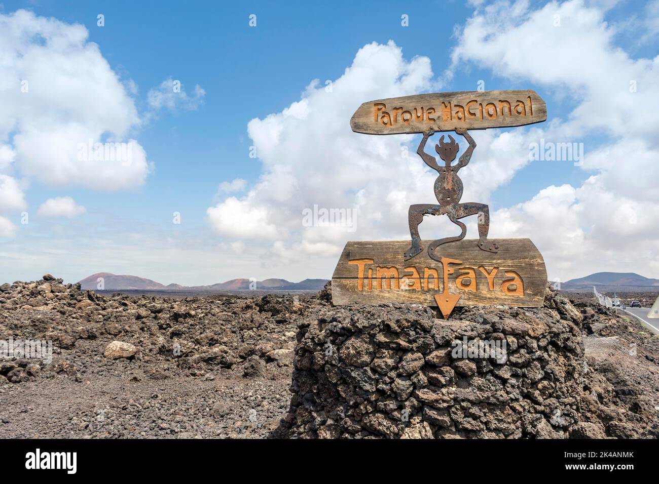 Timanfaya National Park sign on volcanic black rocks in Lanzarote, Canary Islands, Spain Stock Photo