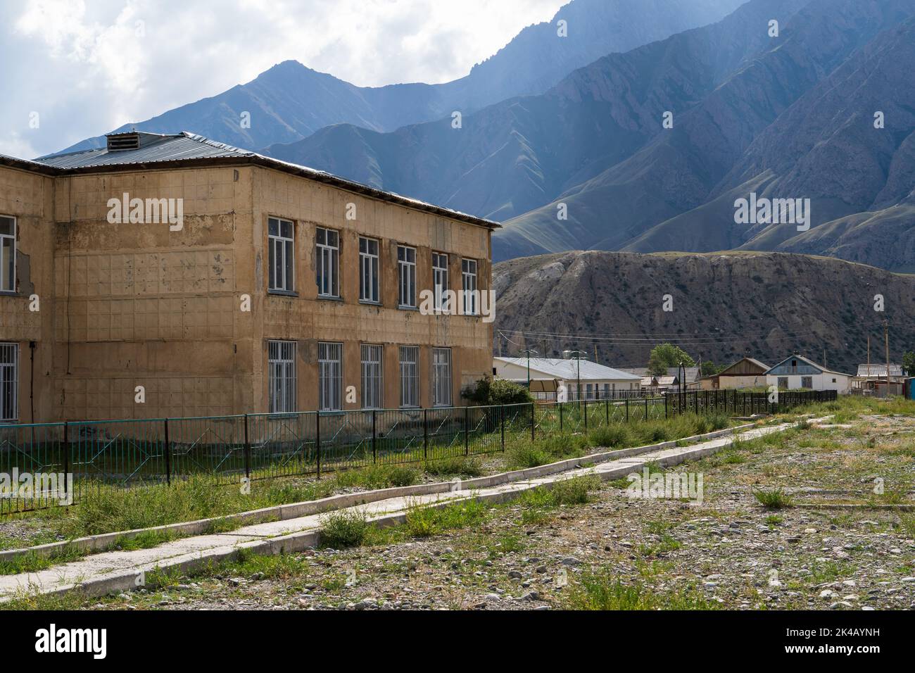 Abandoned school in Enilchek mining ghost town, Kyrgyzstan Stock Photo