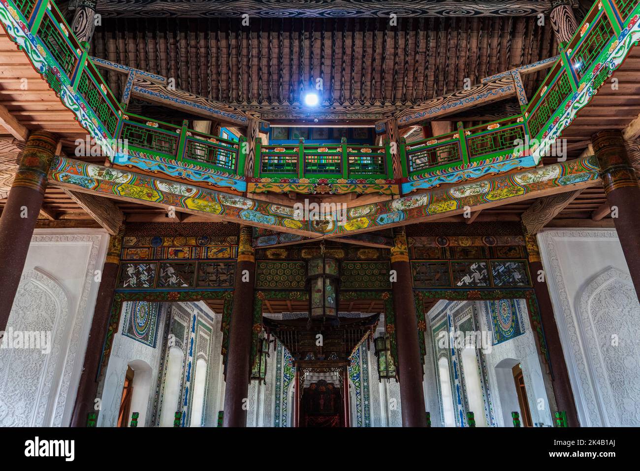 Colourful interior timber hall and structure of Chinese Dungan Uyghur Mosque in Zharkent, Kazakhstan Stock Photo