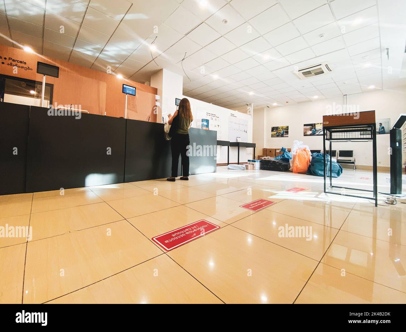 Tbilisi, 25 october, 2022 customer stand alone in post