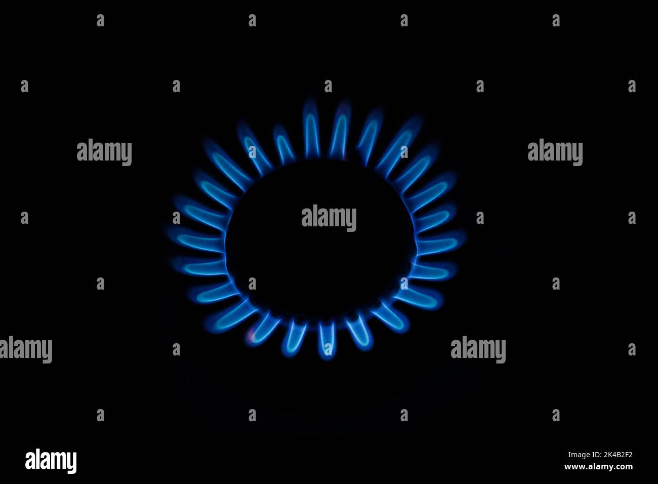 Blue gas flame on a hob, gas cooker, close up Stock Photo Alamy