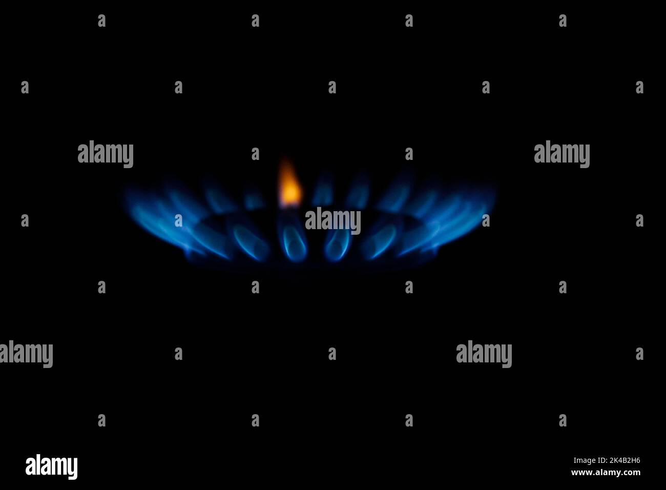 Blue gas flame on a hob, gas cooker, close up Stock Photo Alamy