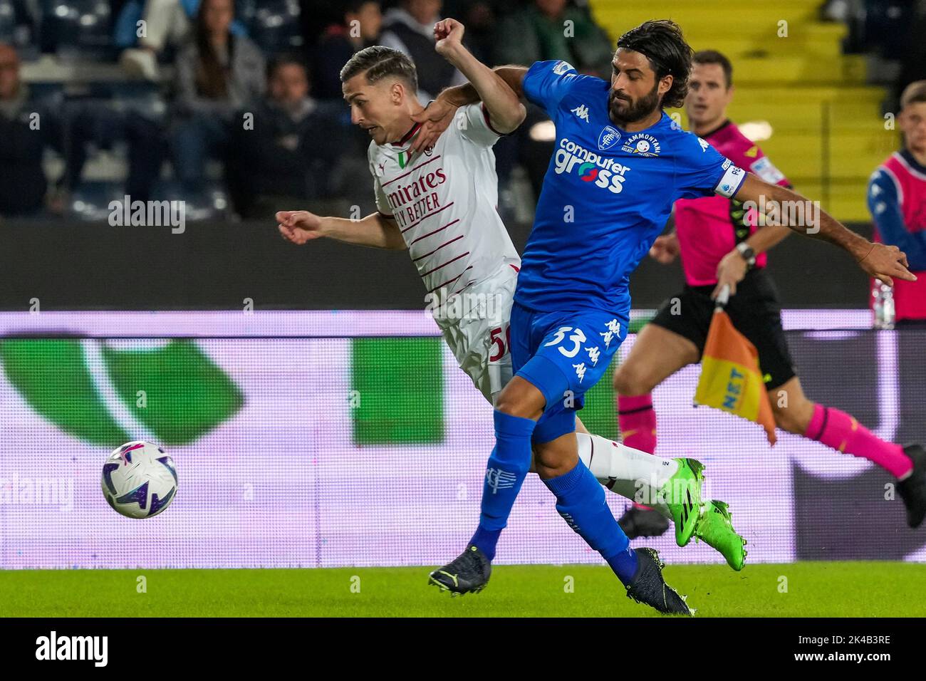 Empoli, Italy. 01st Oct, 2022. Alexis Saelemaekers of AC Milan and Sebastiano Luperto of Empoli FC compete for the ball during the Serie A football match between Empoli FC and AC Milan at Carlo Castellani stadium in Empoli (Italy), October 1st, 2022. Photo Paolo Nucci/Insidefoto Credit: Insidefoto di andrea staccioli/Alamy Live News Stock Photo