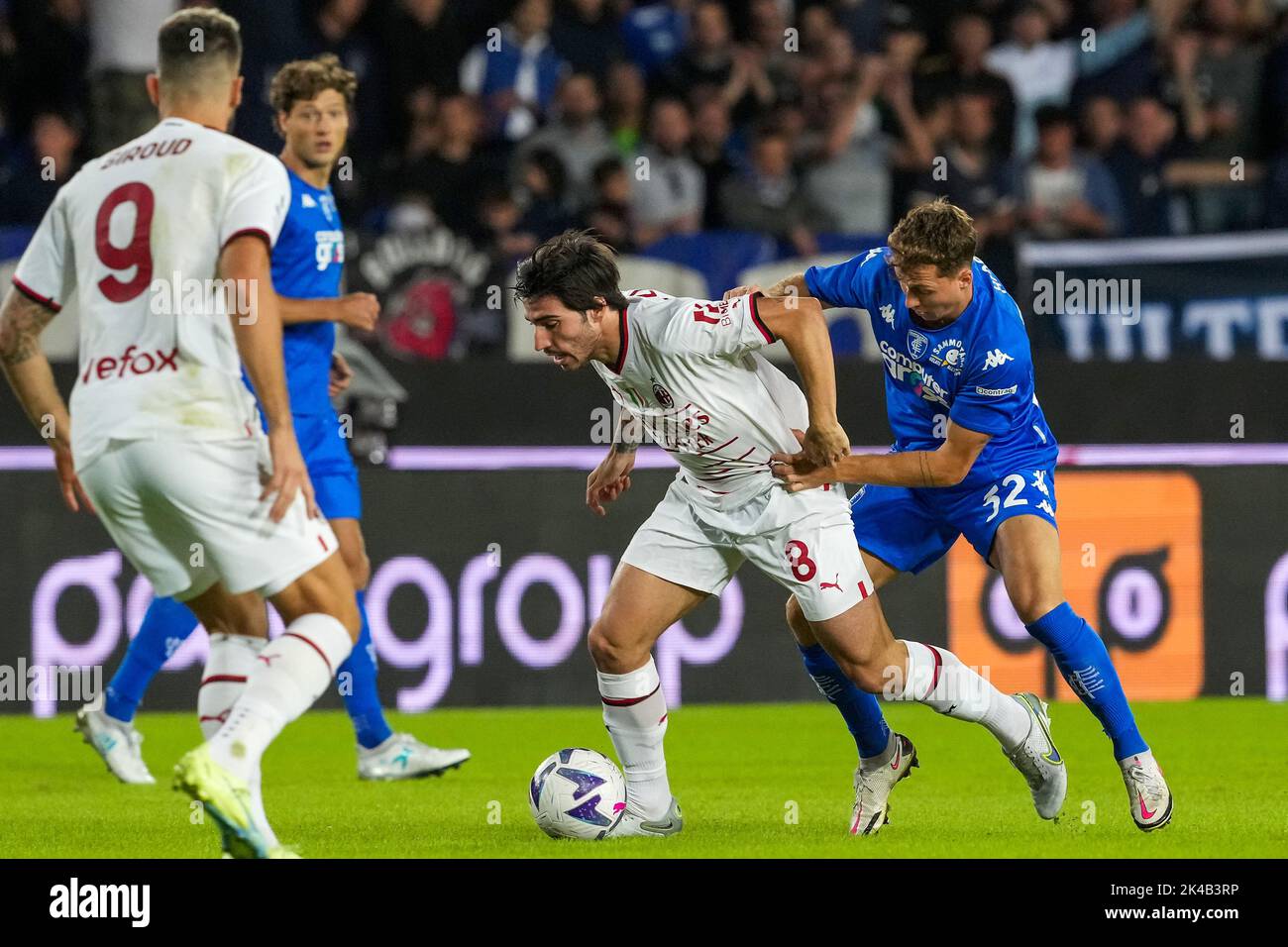 Empoli, Italy. 01st Oct, 2022. Sandro Tonali of AC Milan and Nicolas Haas of Empoli FC compete for the ball during the Serie A football match between Empoli FC and AC Milan at Carlo Castellani stadium in Empoli (Italy), October 1st, 2022. Photo Paolo Nucci/Insidefoto Credit: Insidefoto di andrea staccioli/Alamy Live News Stock Photo