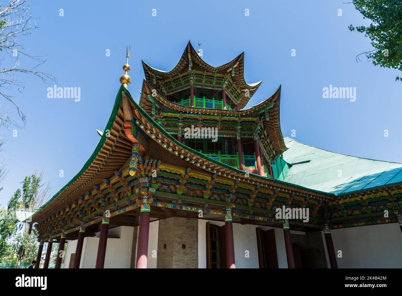 Colourful timber exterior structure and pagoda of Chinese Dungan Uyghur Mosque in Zharkent, Kazakhstan Stock Photo